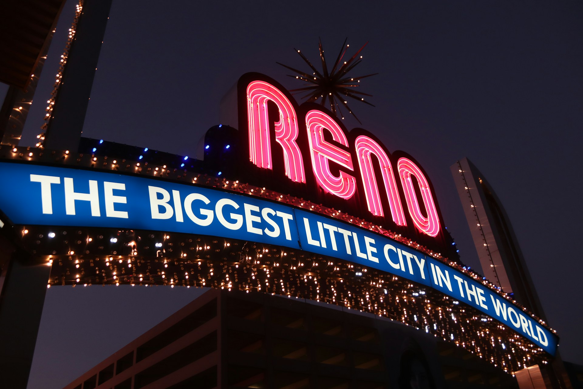Reno Arch at night displaying "The Biggest Little City in the World"