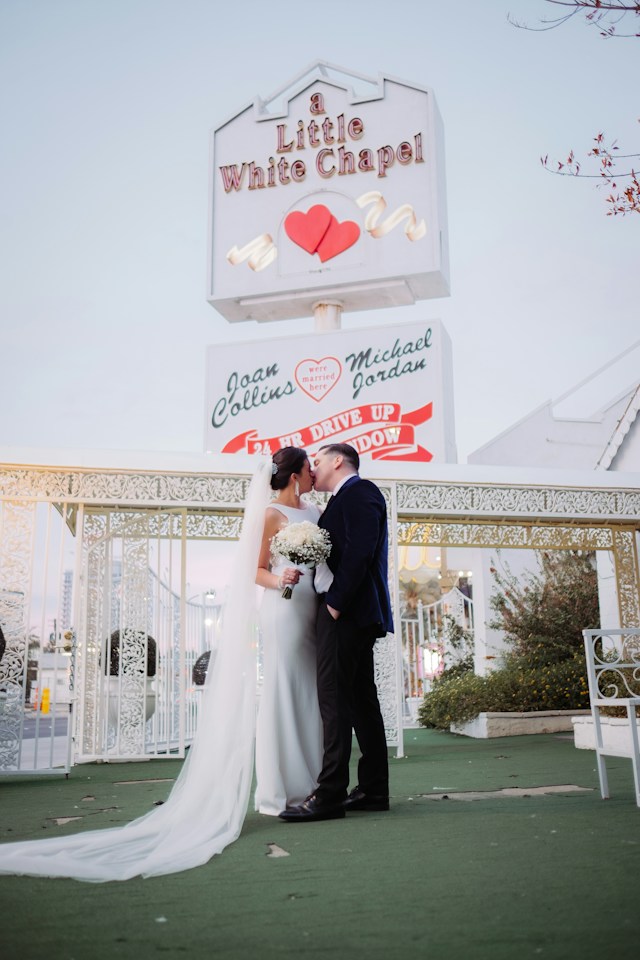 Wedding couple outside A Little White Chapel in Las Vegas